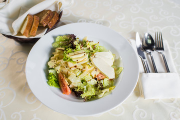 green salad with cheese and vegetables 