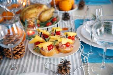 Tasty canapes for festive dinner. Thanksgiving day table setting