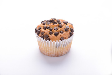 chocolate chip muffin on isolated white background