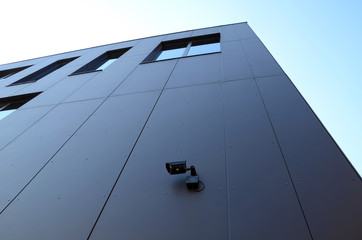 Building with camera surveillance