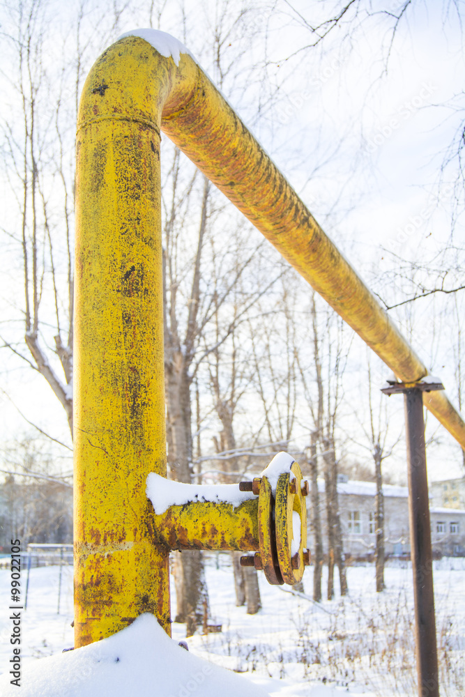 Wall mural yellow piping with gas in the russian city