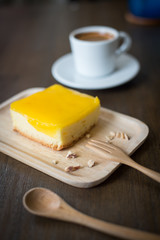 cake on the wood desk in coffee shop