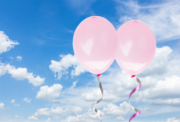 Obraz na płótnie Canvas pink baloons in the sky