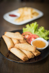 fresh spring rolls on the wood desk