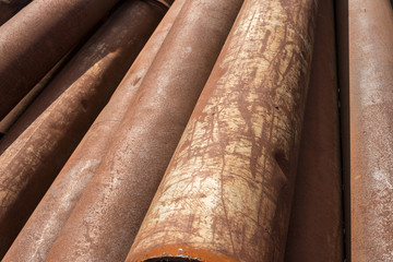 Rusty metal pipes stack
