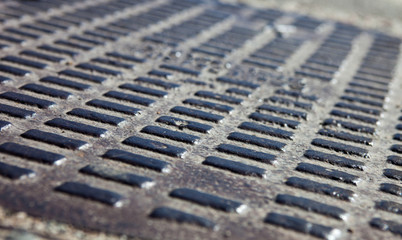 Close up of the metal manhole cover