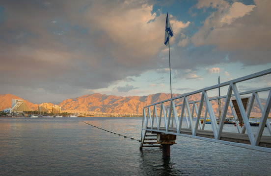 View on the Aqaba gulf (Red Sea) from the central beach of Eilat. Eialt is the southernmost tourist city in Israel, located on the northern shores of the Red Sea.  