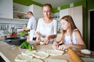 family preparing breakfast