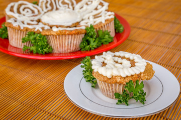 Cream cheese frosted carrot cake cupcakes.