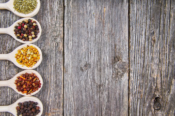 Spices on wooden spoons
