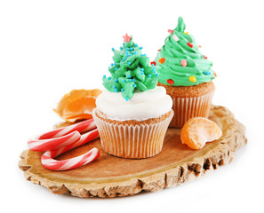 Christmas cupcakes isolated on white
