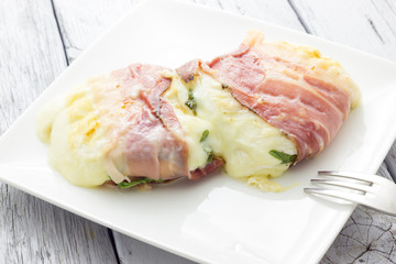 Tomino cheese with bacon