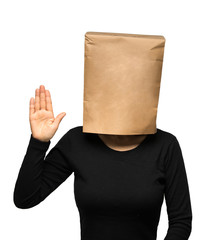 young woman covering his head using a paper bag. Woman oath