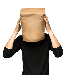 young man covering his head using a paper bag. Man worries