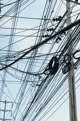 Electrical cables with telephone lines tangled  messy in Bangkok