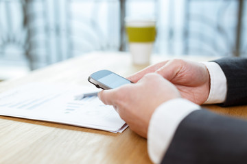 businessman checking financial reports