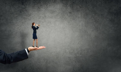 Obraz premium Palm supporting businesswoman