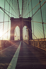 Naklejka na ściany i meble Sunset from Brooklyn Bridge walkway