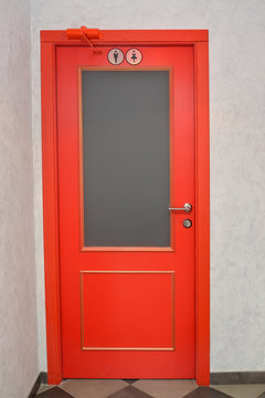 Red door in a public toilet