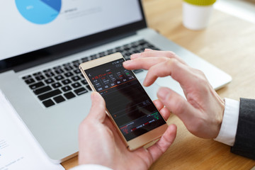 businessman checking financial reports