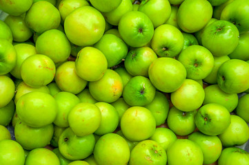 Fototapeta na wymiar Green vietnamese apple in background
