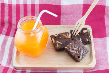 Brownies With Orange Juice On Wood Tray