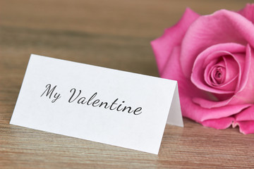 Valentine note with pink rose