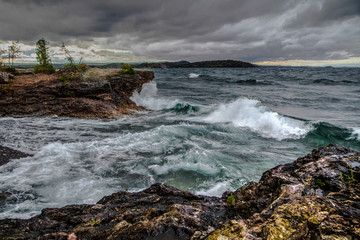 Presque Isle Coast On Moody Lake Superior. Rocky coast of Lake Superior during a November gale. Presque Isle Park in Marquette, Michigan.