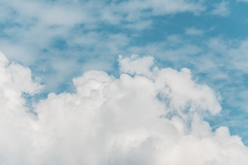 Fluffy clouds and blue sky