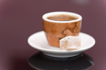 Cup of black coffee and turkish delight