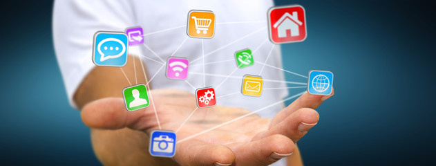 Young man holding digital application