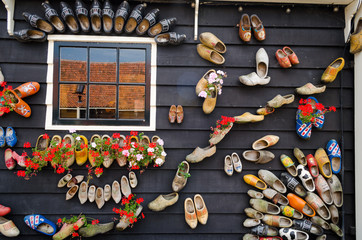 Traditional dutch wooden shoes hanging on a wall as decoration