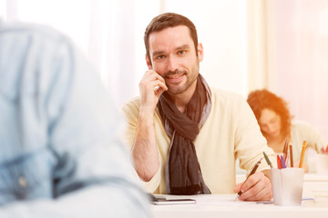 Young attractive student taking exams