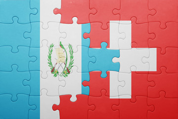 puzzle with the national flag of switzerland and guatemala