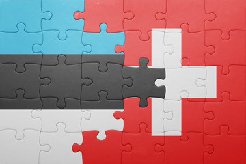 puzzle with the national flag of switzerland and estonia