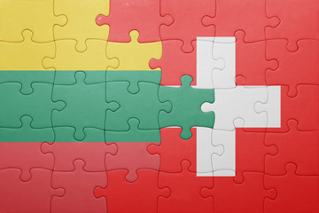 Fototapeta premium puzzle with the national flag of switzerland and lithuania
