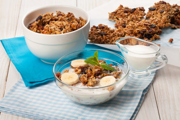 Granola with yogurt and banana in a bowl