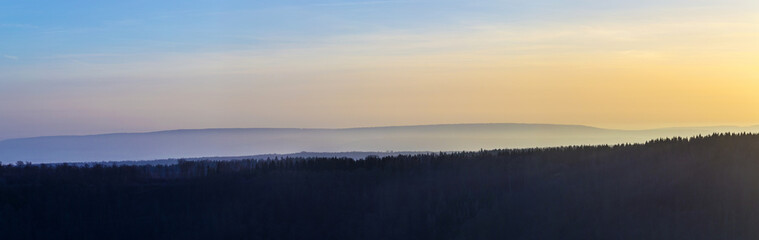Fototapeta premium forest landscape at Kyffhaeuser in sunset