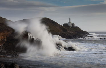 Storm Frank at Mumbles lighthouse and Bracelet Bay, Gower, Swansea.