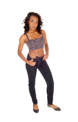 African American woman standing in full light.