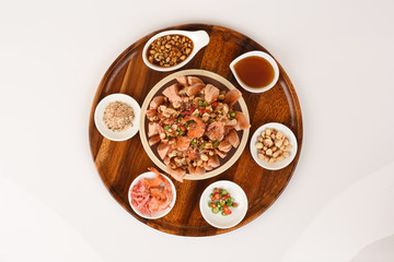 Sweet fish sauce, ground pepper, dried shrimp, peanuts, toasted coconut, sugar syrup and Santol fruit, desserts native Thailand.