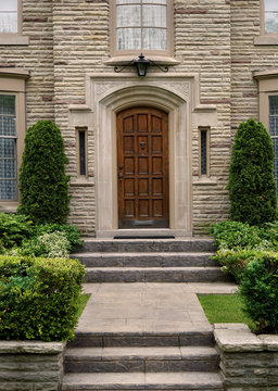 front door with stone trim