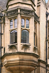 Fototapeta na wymiar oriel window of gothic stone college building