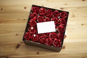 Roses in box with message card
