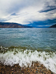 closeup of waves rolling to shore