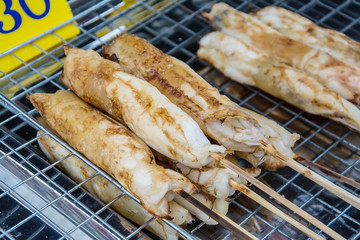 Grilled squid eggs skewers at street food in thailand