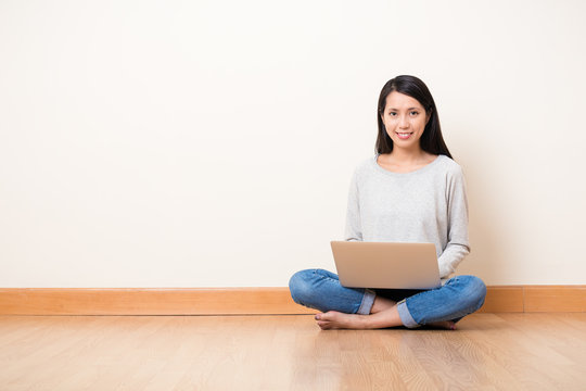Woman online shopping though tablet pc