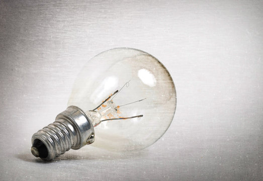 Old lightbulb isolated on a white background
