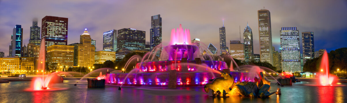 Chicago skyline panorama with Buckingham Fountain at night, United States