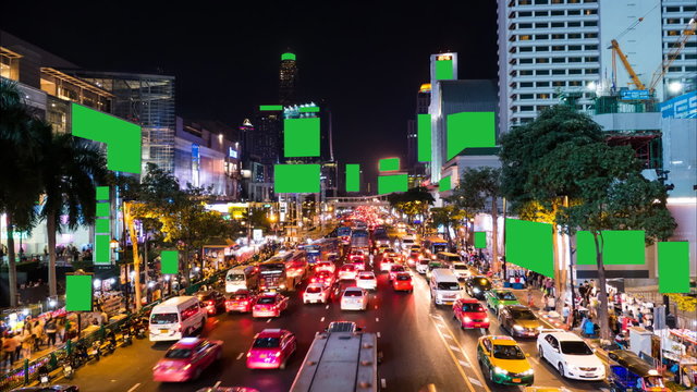 Bustling crowds and traffic jam and the advertising billboards at downtown. time lapse.